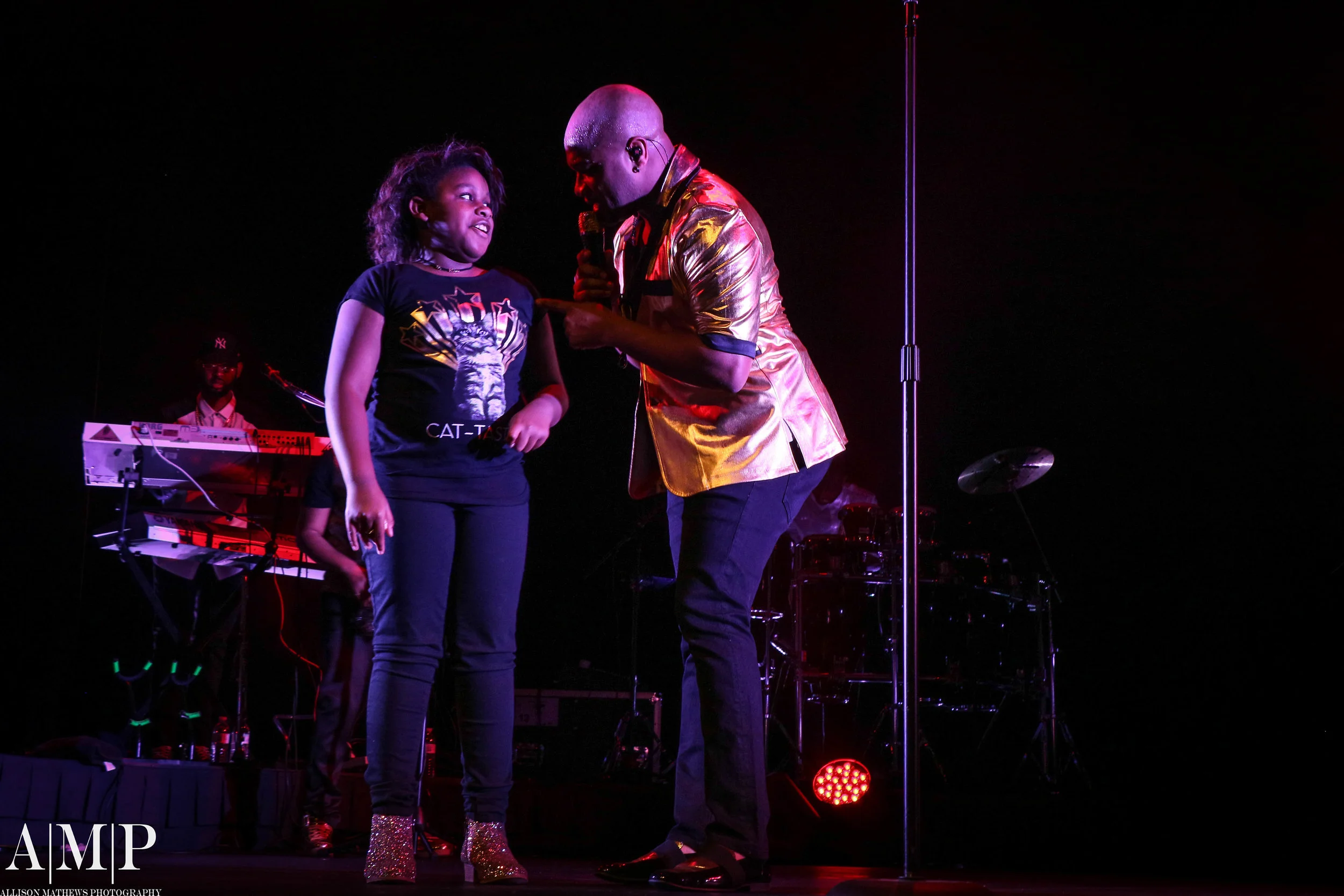 A "Golden Moment" on stage with his adorable daughter during his Prince Tribute. 