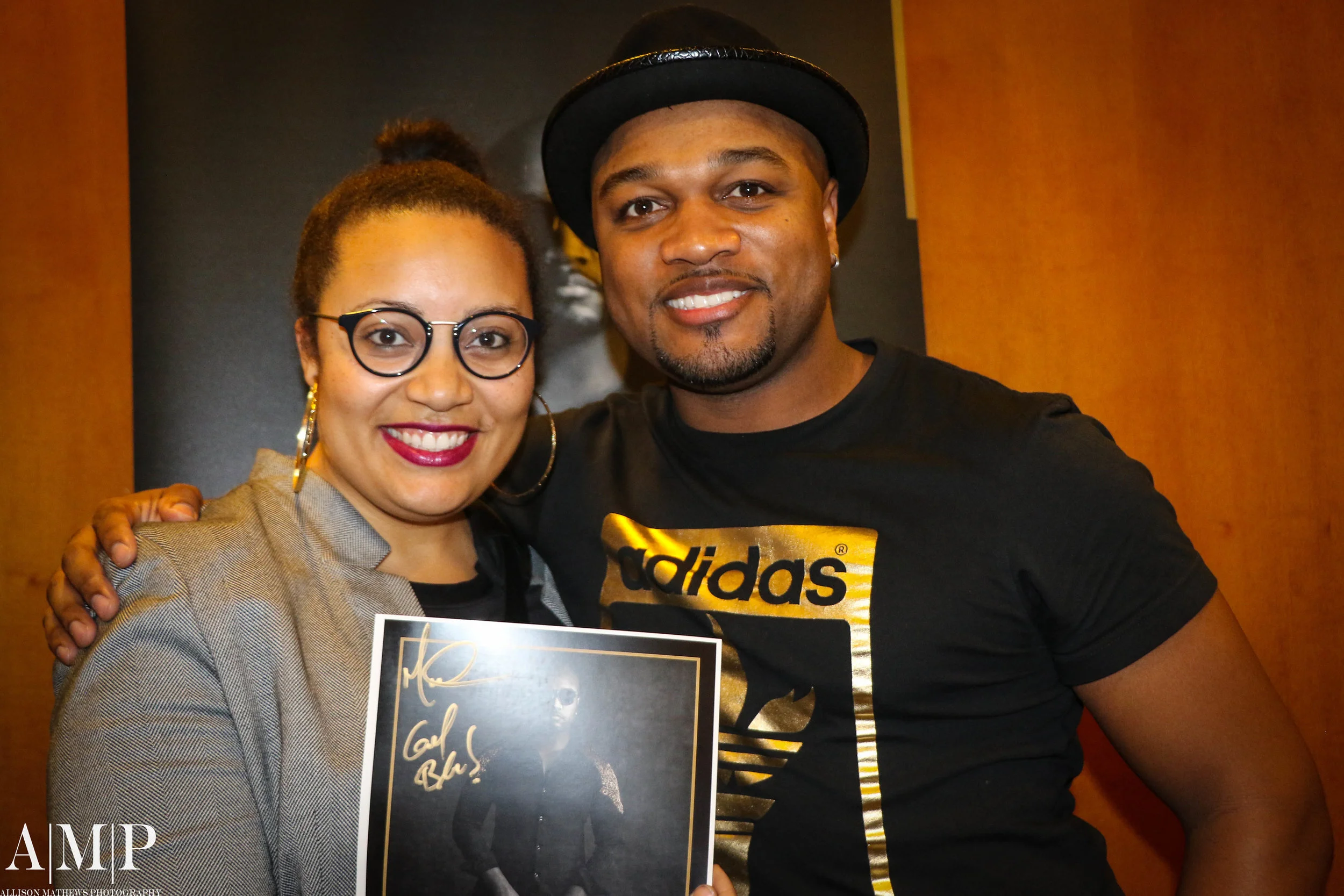 Photographer Dr. Allison Mathews takes a candid pic with Marcus Anderson!