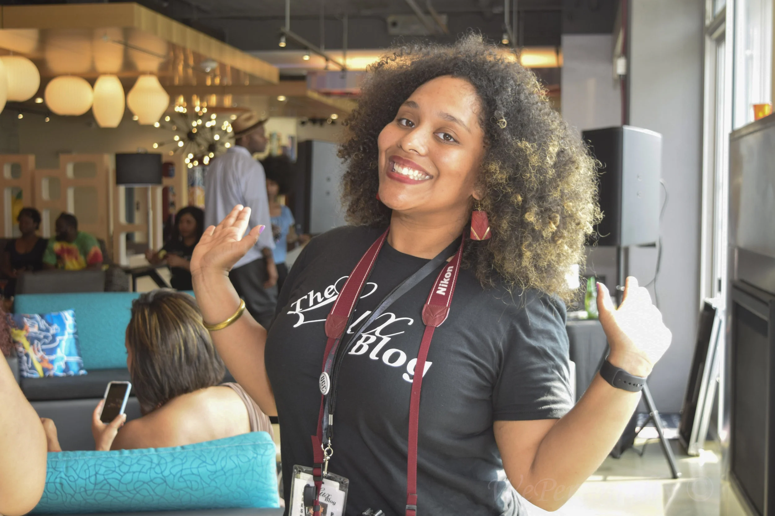 Our Photographer Alex of AfroCurl Photography poses for the camera!