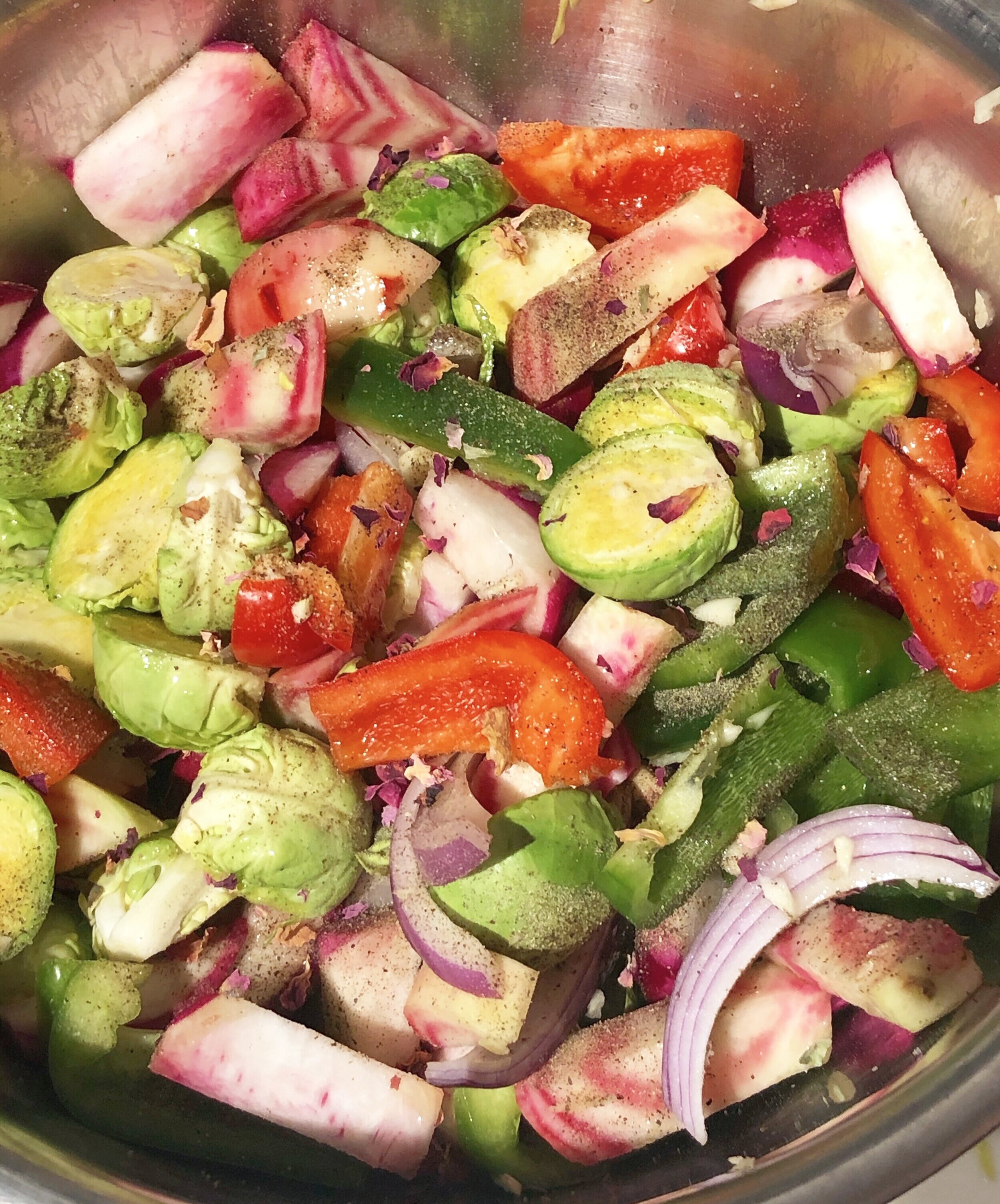Step 3: Toss the veggies in EVOO, S+P, and rose petals.