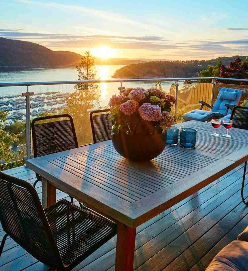 rooftop patio overlooking the ocean and sunset