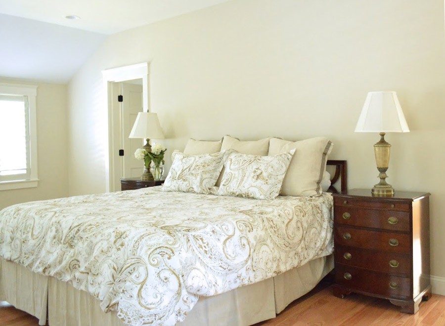 Serene master bedroom painted in Benjamin Moore's White Sand.jpg