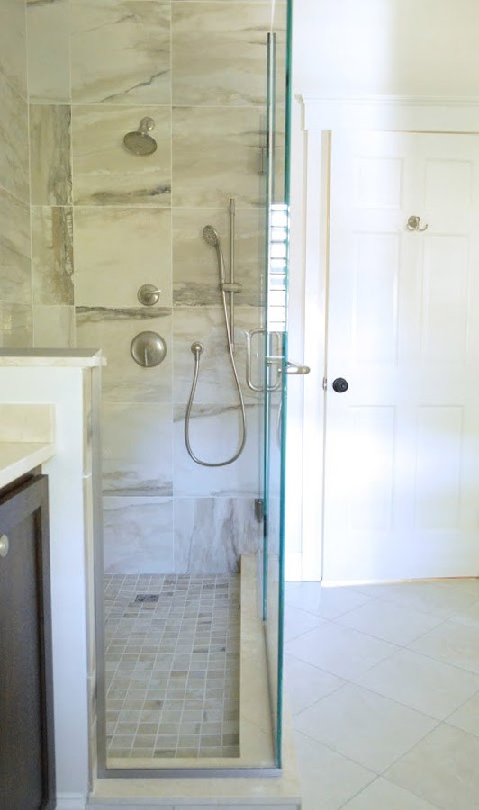 Floor to ceiling tile creates for an impressive walk-in shower.jpg