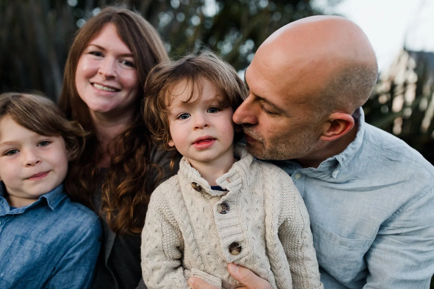 family of four - mom, dad, and 2 sons