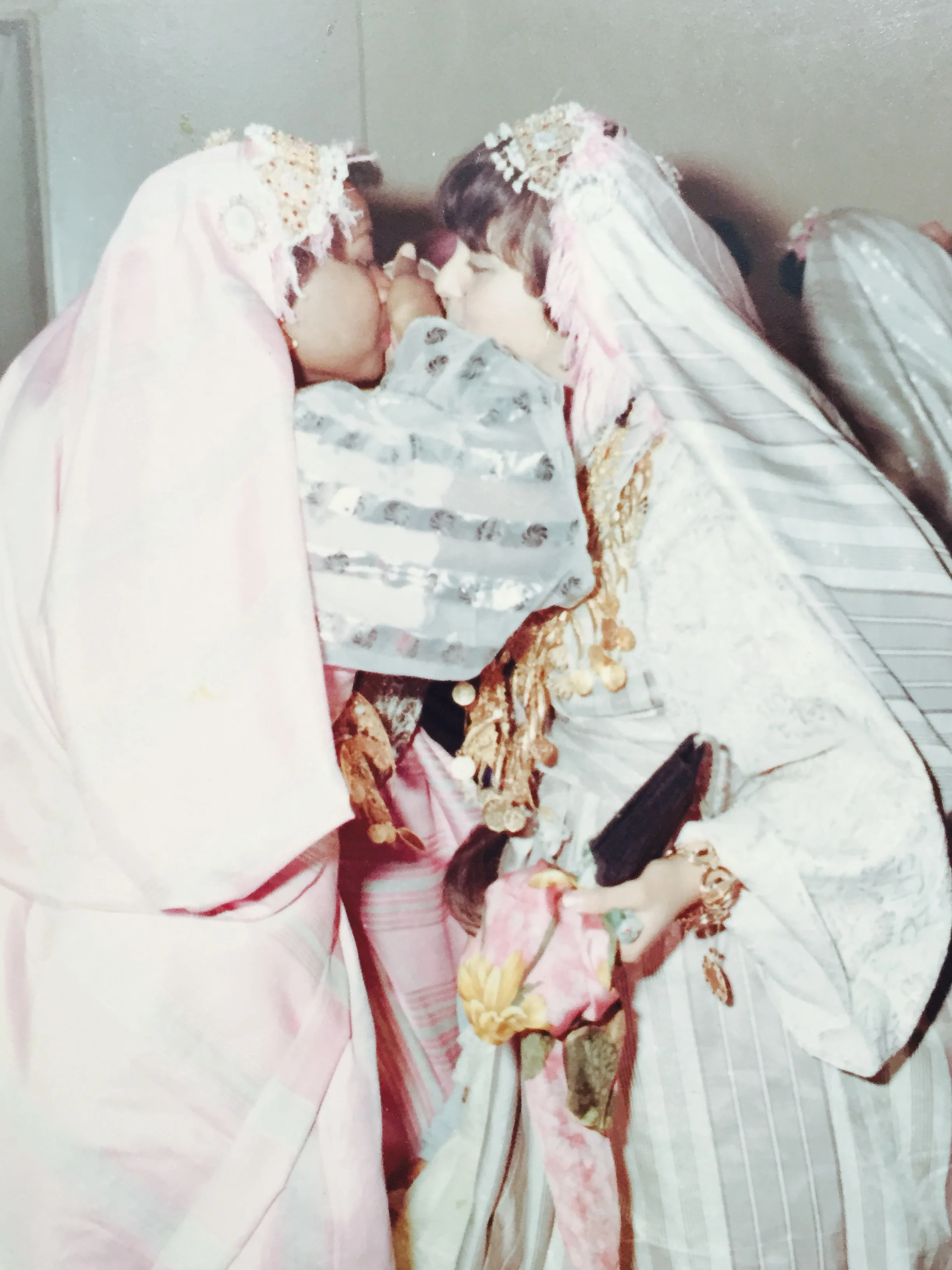 Tripolitanian ladies greeting each other. Photo from Najlaa El-Ageli archives. 