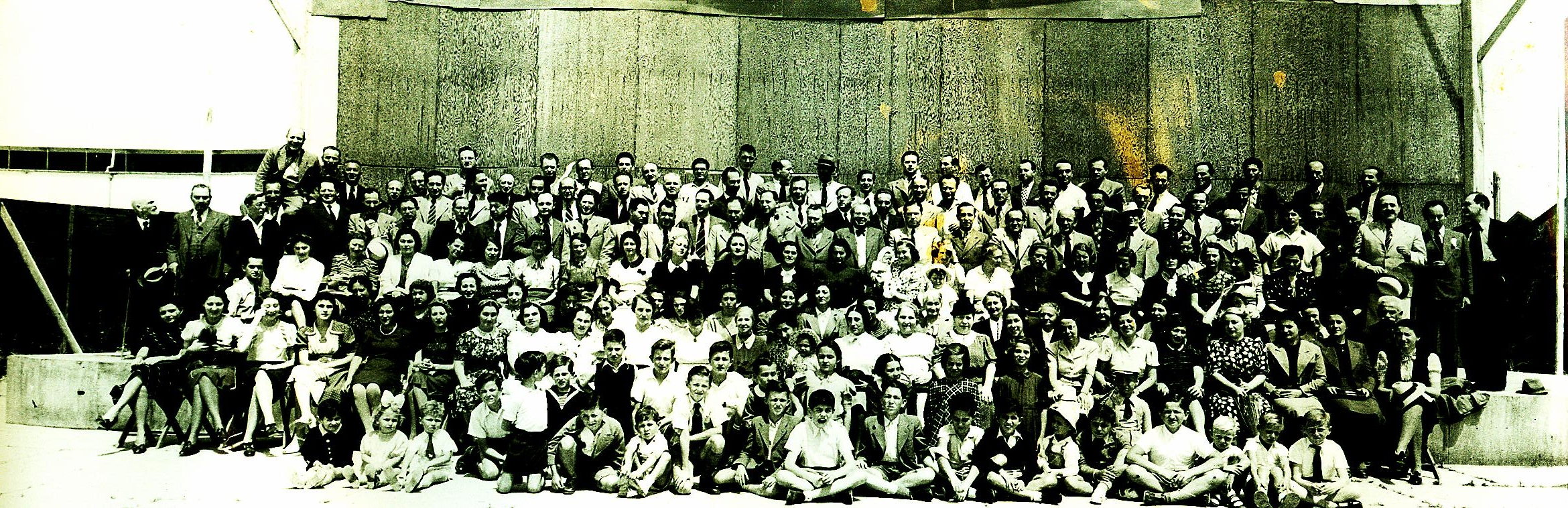 The members of the Palestine orcheastra with their family members. Date around 1938-1937, in Tel-Aviv Gani Hataarucha. Its done behind the