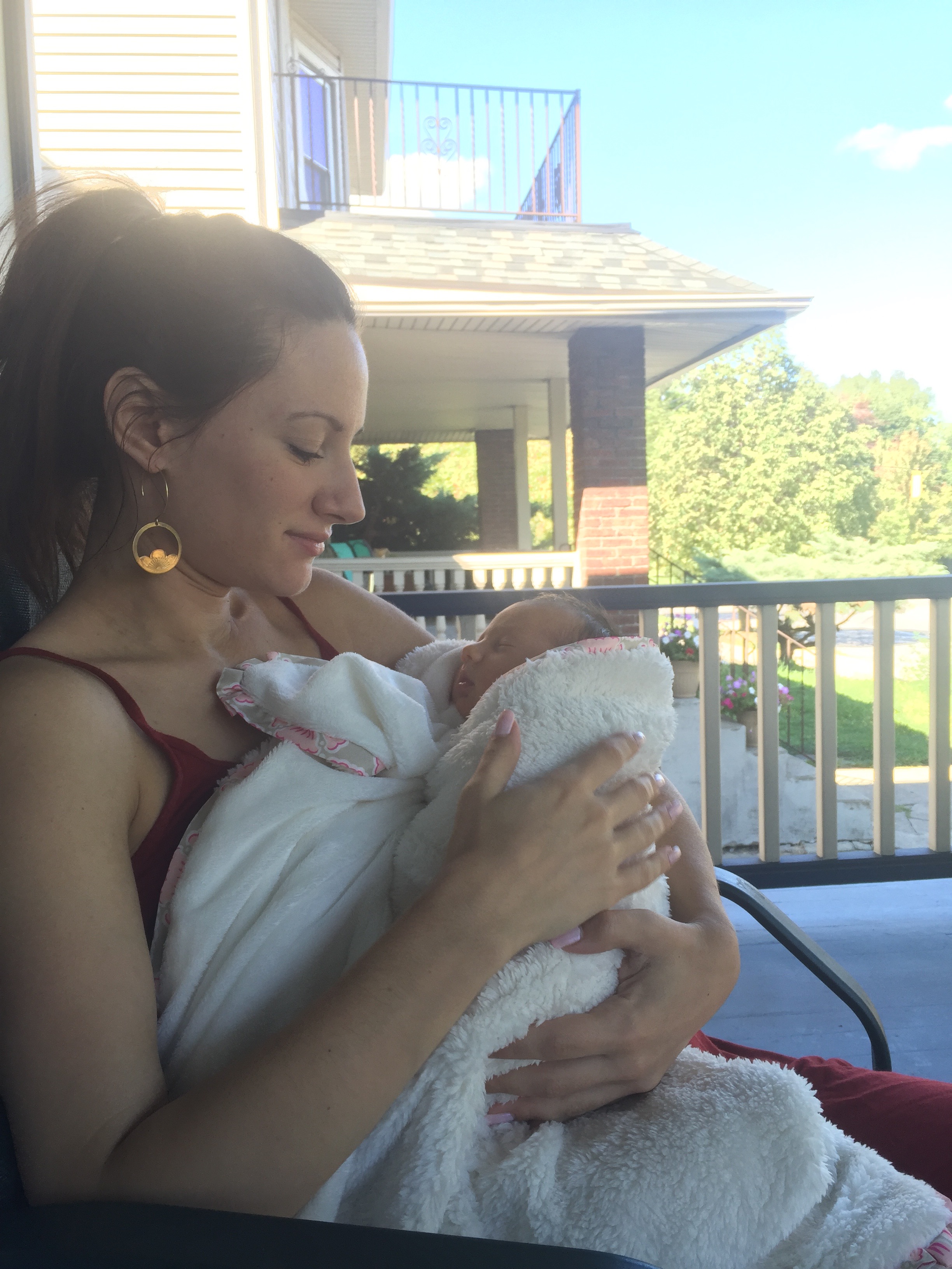 A couple days old, snug in a blanket. This beautiful little scene was almost 1 year ago. 