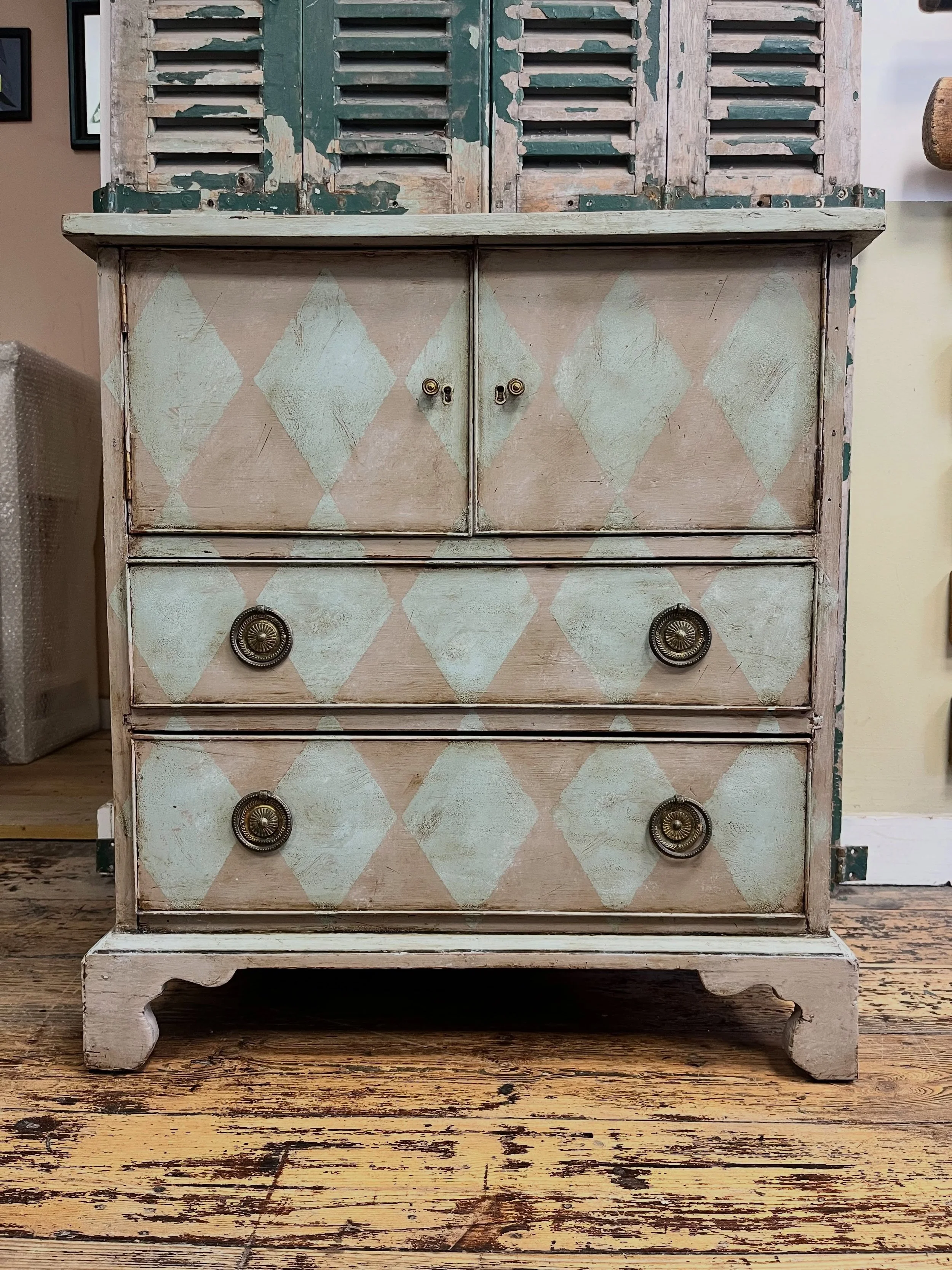 If you like your vintage furniture unique, playfully designed, full of character and with an aged patina, this lovely little cupboard with drawers could be right up your street!

And what room would we suggest this piece is most suited to? Well anywh
