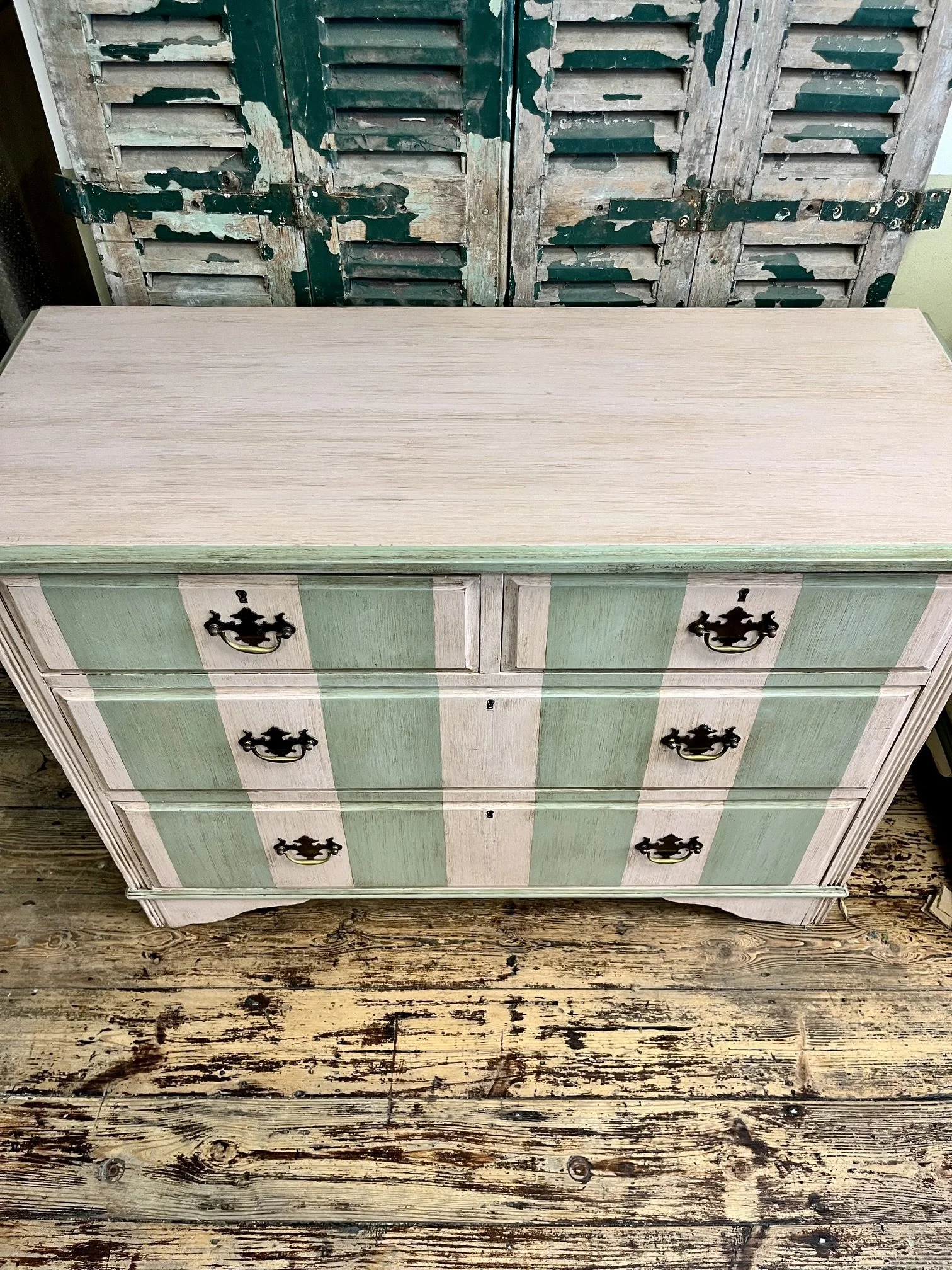 winterbearhome-pink-and-green-striped-chest-of-drawers.jpeg