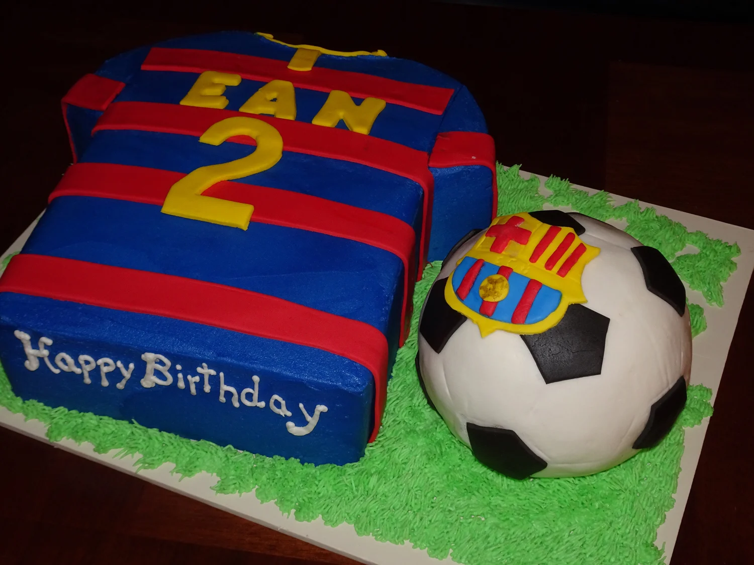 3 25 SOCCER SHAPED CAKE.jpg