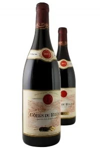 E. Guigal Cotes du Rhone Rouge , $12 - $15 This full-bodied bottle possesses a bouquet of berry and spice, leading to a palate of black fruits, a touch of chocolate and green vegetation, all in a silky texture.