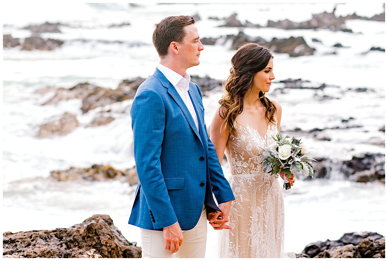 Bride and groom standing on the beach during a Maui elopement ceremony