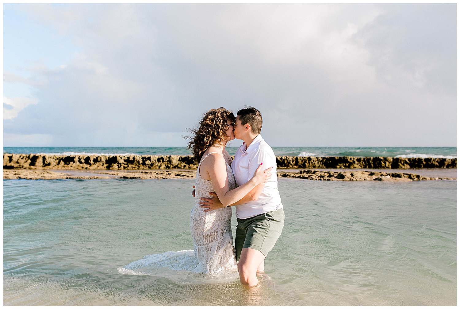 Couple trashing the dress on Maui beach