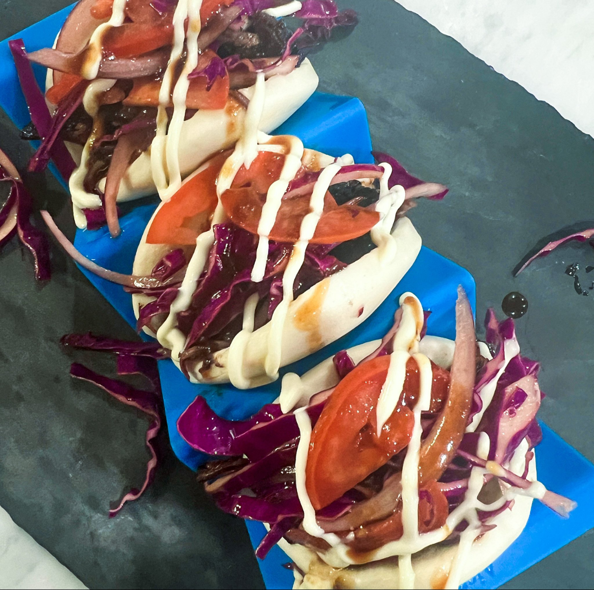 sticky short rib bao buns with balsamic slaw