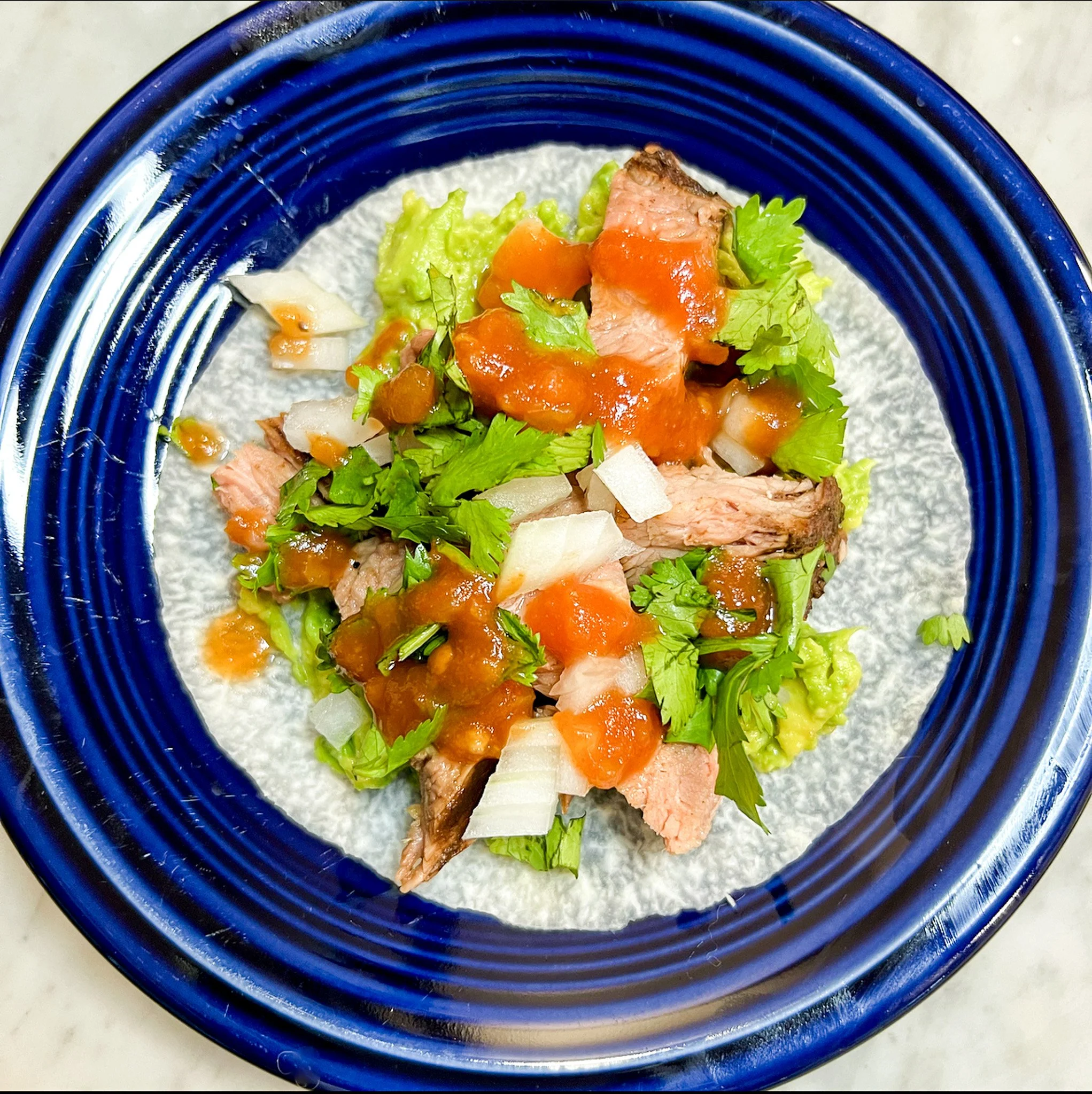 michelada marinated flank steak tacos with saucy salsa