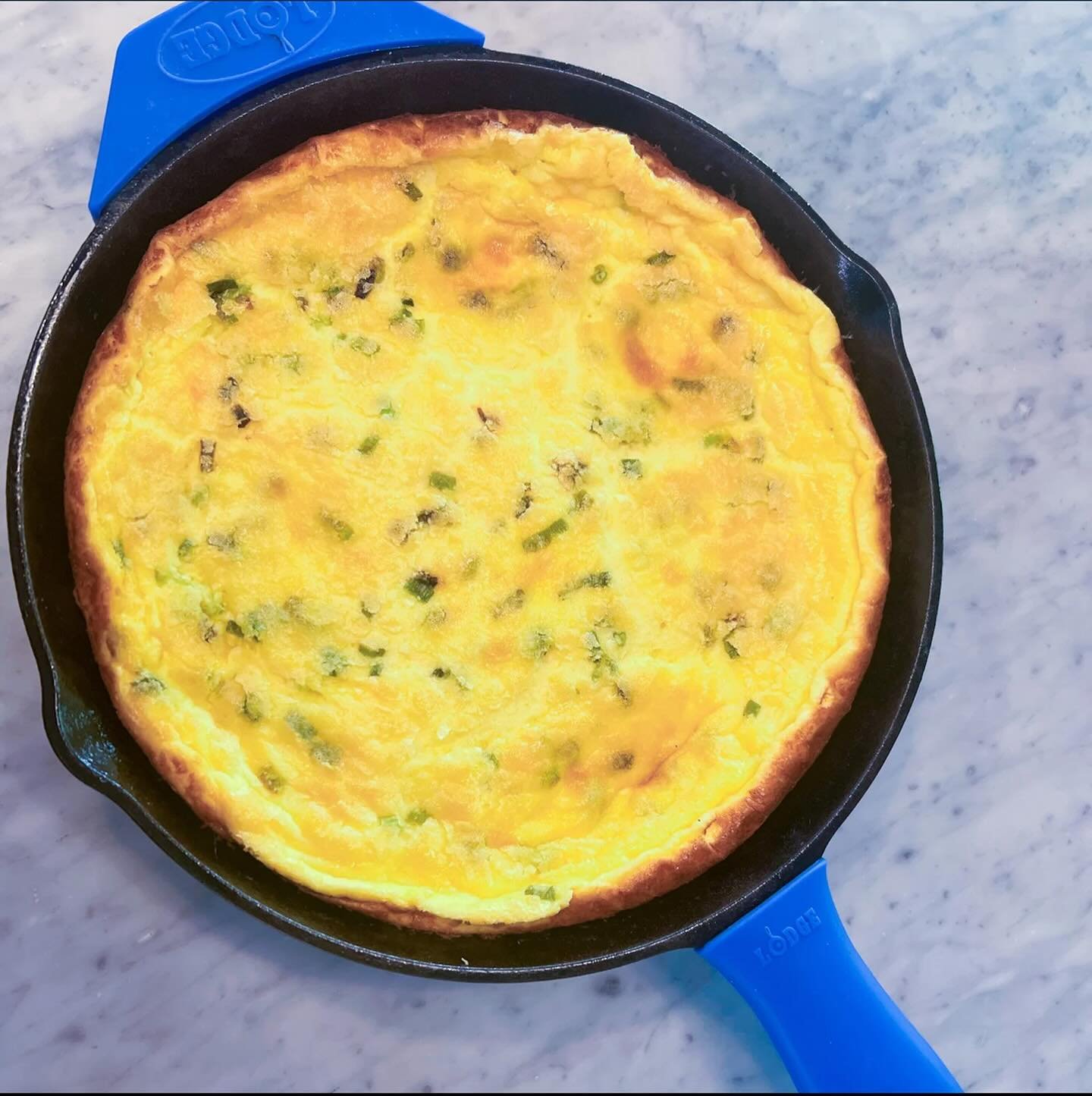 Holiday breakfast/brunch of champions. 

This vegetarian egg puff is the staple of my holiday mornings at home - while also easy to pack up and bring to a teacher breakfast or potluck. The holidays are here!

Ingredients:

2 T evoo
1 bunch scallions,