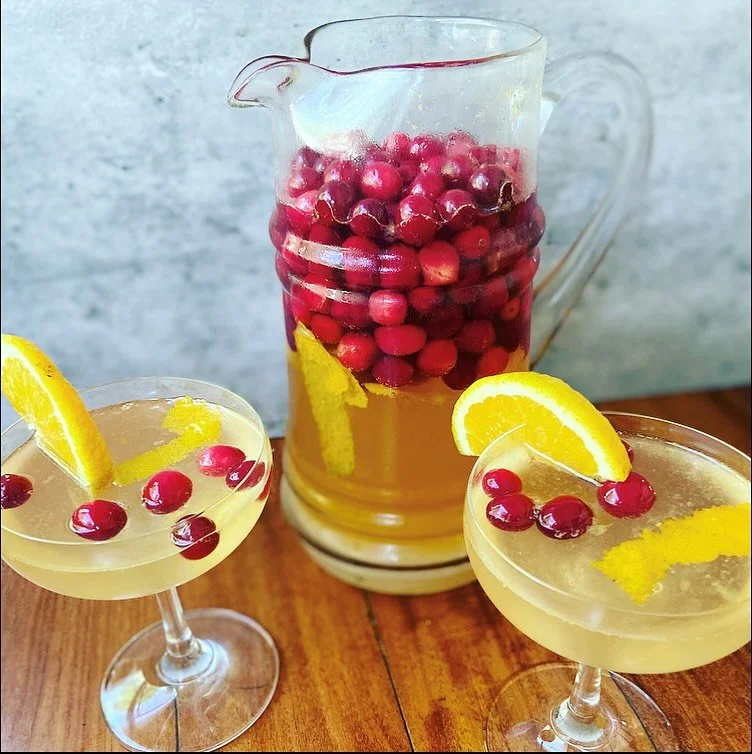 Holiday sangria? Yes, please, and thank you...

Ingredients:

12 oz of sugared cranberries
juice and peeled rind of 2 oranges
1/2 c cranberry simple syrup
8 T grand marnier
1 bottle brut champagne
1 can sparkling tangerine flavored water
sparkling cr