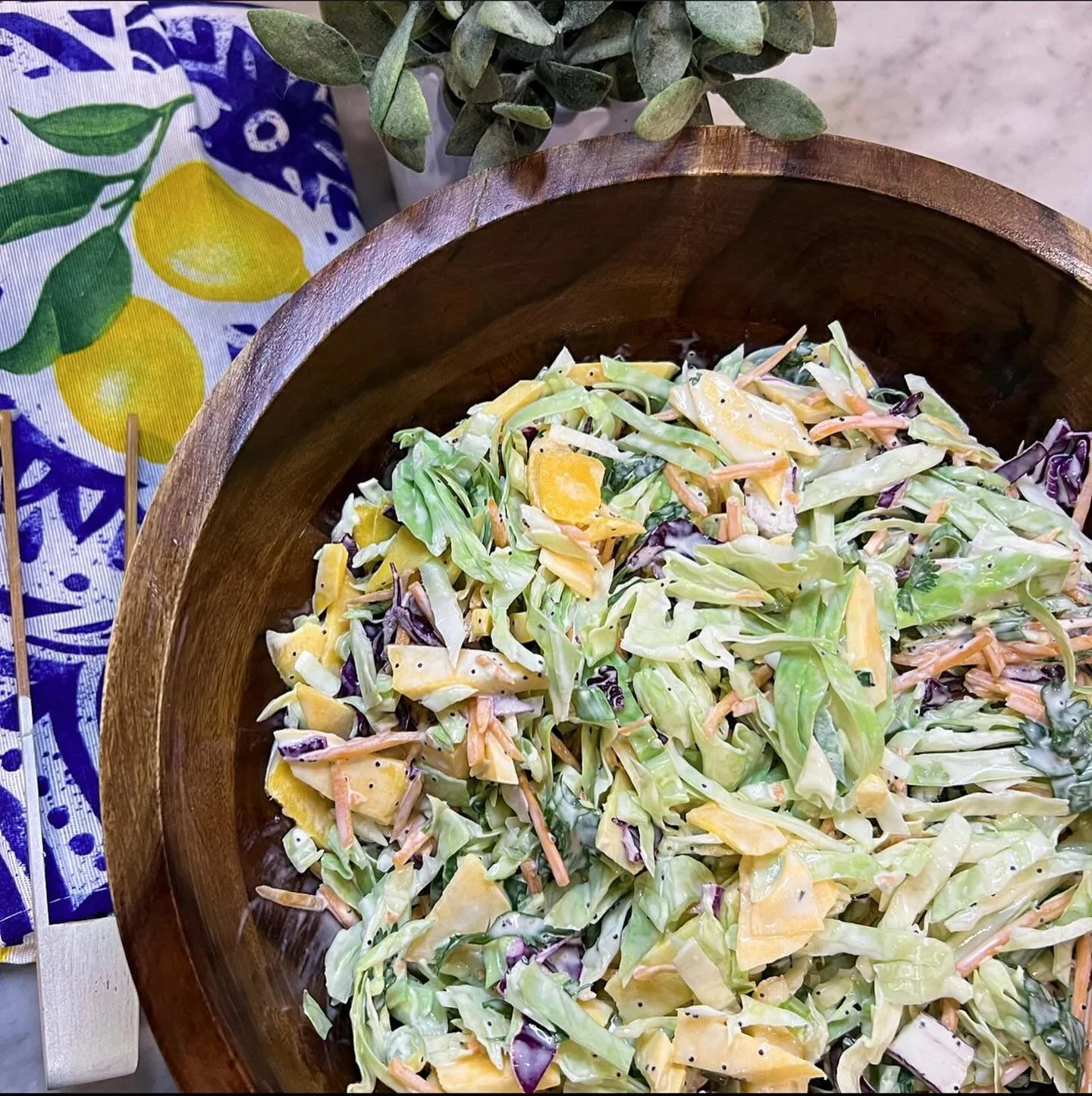 Creamy poppy seed sweet and tangy slaw... perfect for your Super Bowl line up.

Ingredients:

6 c shredded green cabbage
1 c shredded red cabbage
1 c shredded carrots
3 scallions, chopped
1 1/2 c thinly sliced mango

3/4 jalepeno, seeded and thinly s