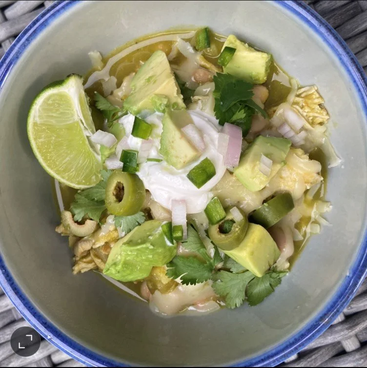 It's overcast and slightly chilly, far cry from the high 70's we've been having. Which makes it the perfect day to bust out this chicken chili verde-- all the flavors you want in chicken enchiladas simmered together to make a large bowl of comfort.

