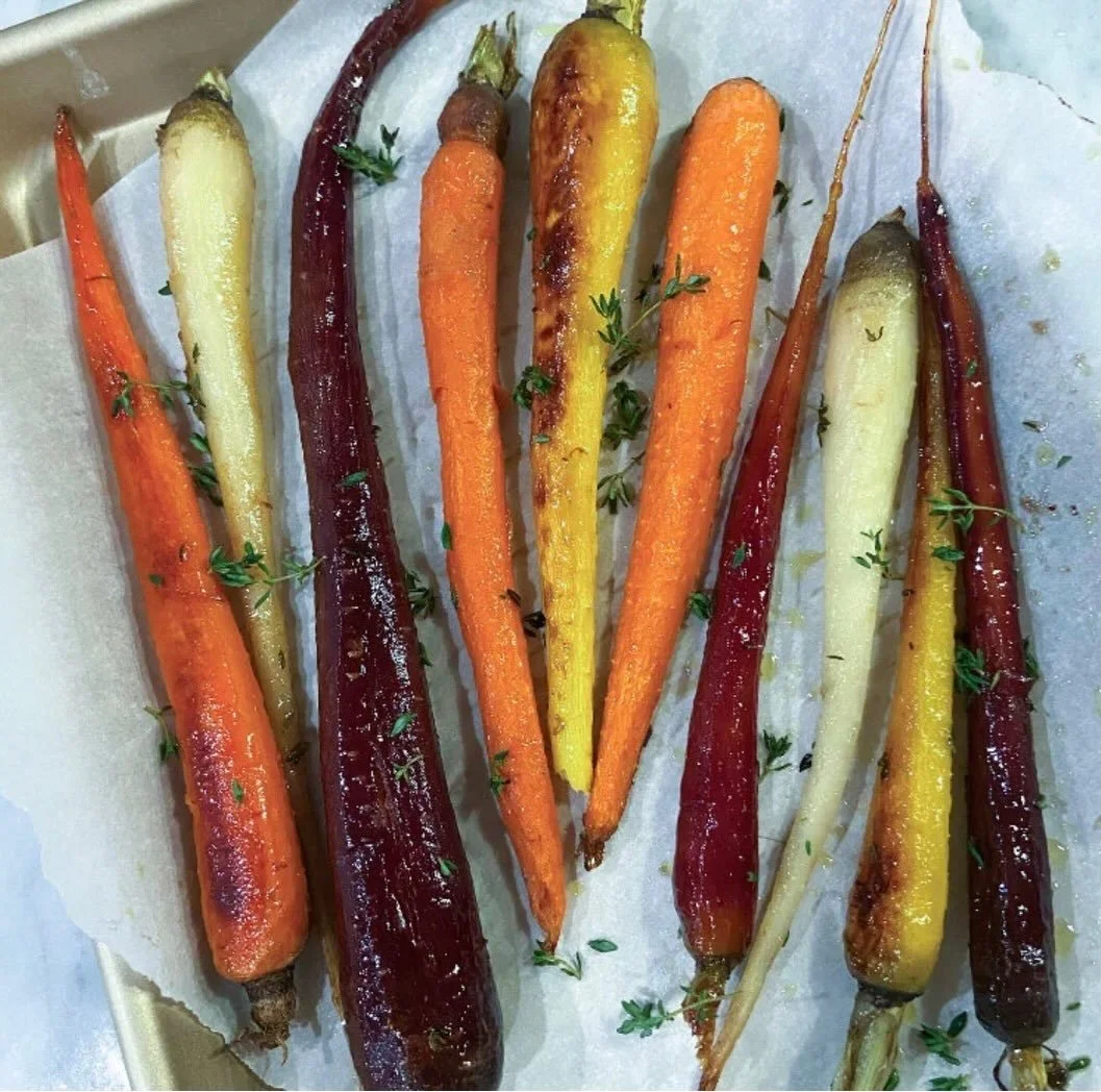 If you aren't making these honey thyme roasted carrots for Easter dinner, you may want to rethink your menu.

Ingredients:

16 carrots, peeled
1/4 c evoo
1/4 c local honey
1 t salt
7 sprigs of thyme, divided use, stems discarded

Directions:

Preheat