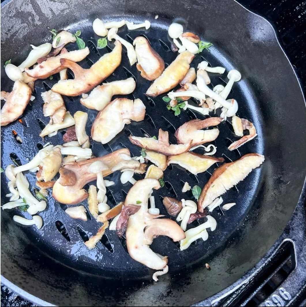 It's mushroom day!
And to celebrate, here's my recipe for grilled mushrooms.
I know they aren't everyone's cup of tea. But they sure are mine.

Ingredients:

5 oz shiitake mushrooms
handful of enoki mushrooms
leaves from 3 stems of fresh oregano
1/2 