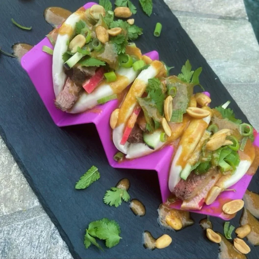 Grilled tri tip baos with mint cilantro salad, pickled watermelon radish and cucumber, slathered with a peanut butter aioli...

Ingredients:

1/3 c chunky peanut butter
1/2 c kewpie mayo
2 T sesame oil
1 t granulated garlic
2 T honey
2 T coconut amin