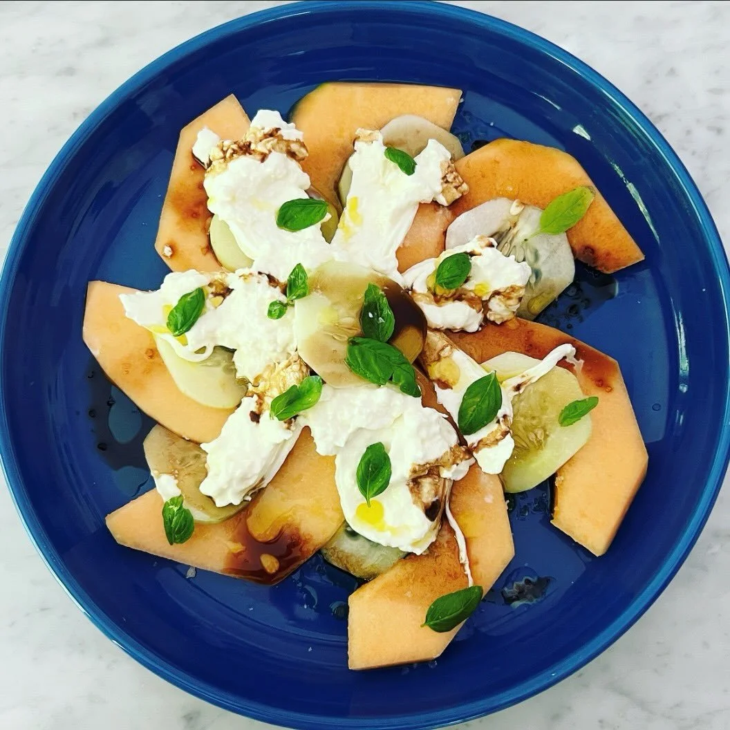 'Tis the season... for cantaloupe caprese

Ingredients:

1/2 cucumber, peeled and sliced
1/2 cantaloupe, seeded, peeled, and sliced
4 oz burrata
baby basil leaves
fig balsamic vinegar
evoo
maldon salt

Directions:

Alternate melon and cucumber. 
Brea