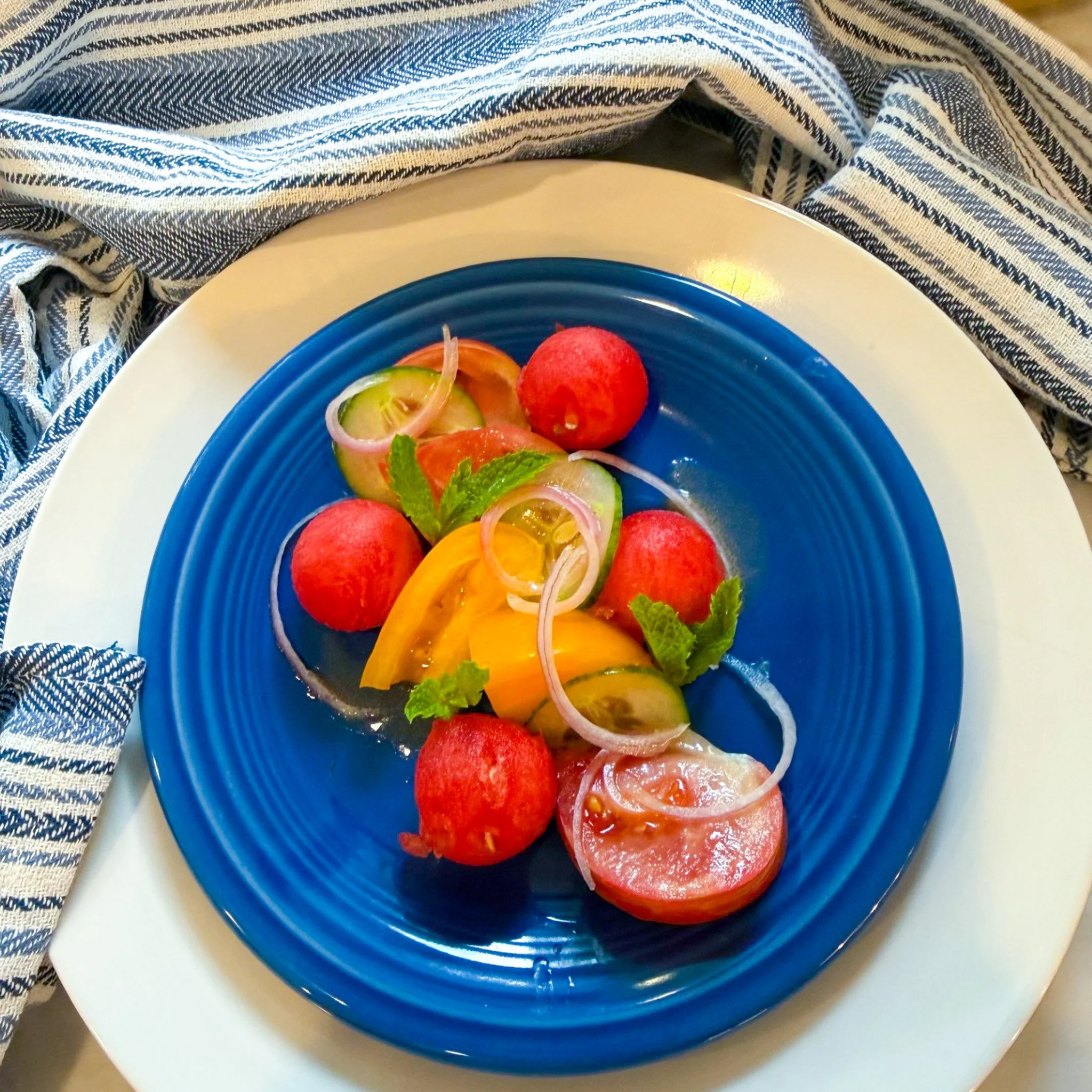 heirloom tomato and watermelon salad with tomato water vin