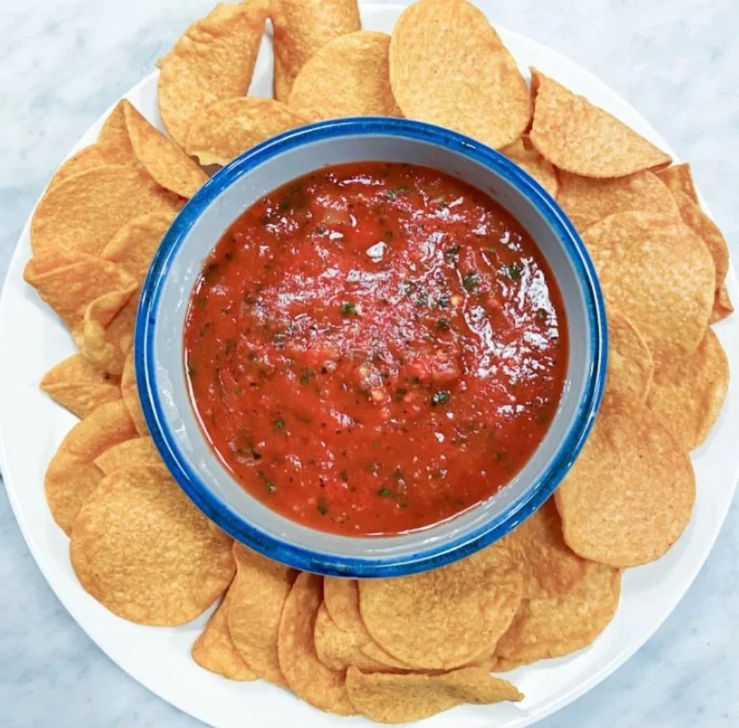 Restaurant style salsa.. quite possibly your next best obsession... 

Ingredients: 

28oz can fire roasted whole tomatoes
4 oz can diced hatch chilis
juice of two limes
2 cloves of garlic
1 1/2 t coarse ground black pepper
1/4 onion rough chopped
1 b