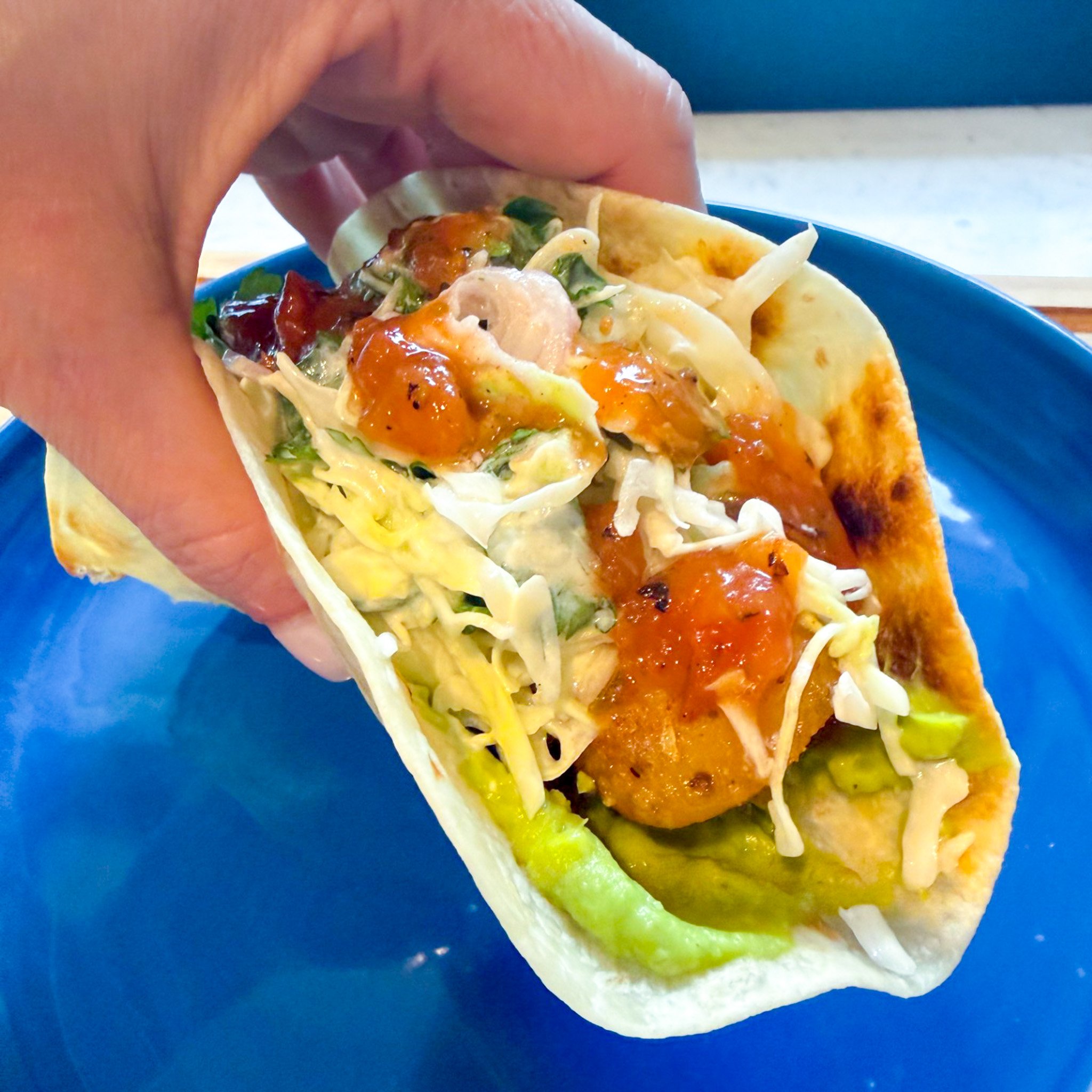 beer battered fish tacos with crema slaw