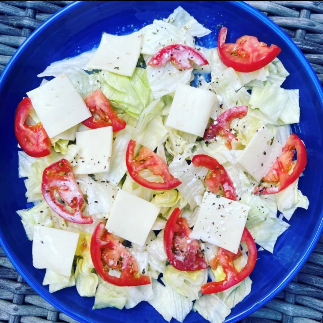 Here's my play on our old hometown Pernicano's pizza tomato and lettuce salad. The perfect pizza pairing side, with the most epic creamy italian dressing...

Ingredients:

1/2 c white wine vinegar
1 T grated parmesan cheese
1/4 t pepper
1 t salt
1 t 