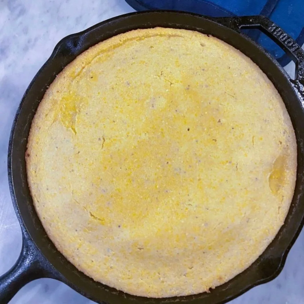 Skillet cornbread- it's the perfect pairing for the kinda cozy meal I always prepare before trick or treating...

Ingredients:

3/4 c melted butter, 2 T of which will coat the pan
2 c all purpose flour
2 c yellow cornmeal
1 T baking powder
2 t salt
1