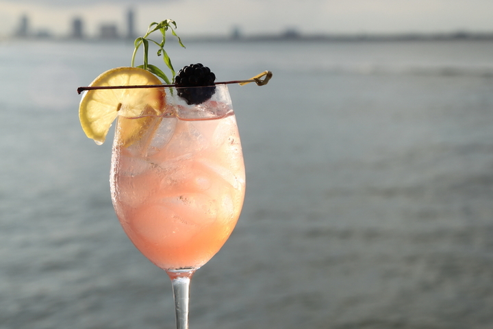Happy Guru: A surprisingly fresh whiskey cocktail with raspberries and a hint of tarragon. It's solid whiskey base is softened and has an unexpected breath of fresh lemon making it perfect for less experienced whiskey drinkers. Ingredients : 1 3/4 oz Organic White Whisky Organic Raspberry Syrup Fresh Lemon Juice Tarragon Leaves Combine 3 tarragon leaves in mixing glass with whiskey, lemon juice and raspberry syrup (do not muddle the tarragon, it should be subtle.) Shake together and strain over ice. Garnish with sprig of tarragon and fresh blackberries. How to make Organic Raspberry Syrup: Soak fresh raspberries in simple syrup and keep refrigerated for 24 hours. Strain fresh fruit once infused.