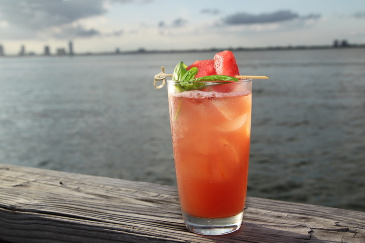 Agua Fresca: Rose syrup is the hidden ingredient that adds a subtle yet essential layer to enhance the fresh basil. Juicy watermelon and lime is added to create complexity, and when prepared properly this is the perfect well-crafted mocktail. Ingredients : 3 or 4 cubes of fresh cut Watermelon A1 1/2 oz Organic Rose Syrup (we use Royal Rose organic syrups) Add chiffonade of Fresh Basil (about 2 large leaves) 1 oz fresh lime juice 6 oz Perrier Muddle fresh cut Watermelon and add the Organic Rose Syrup. Add fresh basil and lime juice, then top with Perrier. Shake vigorously. Garnish with a fresh basil leaf and watermelon cubes.