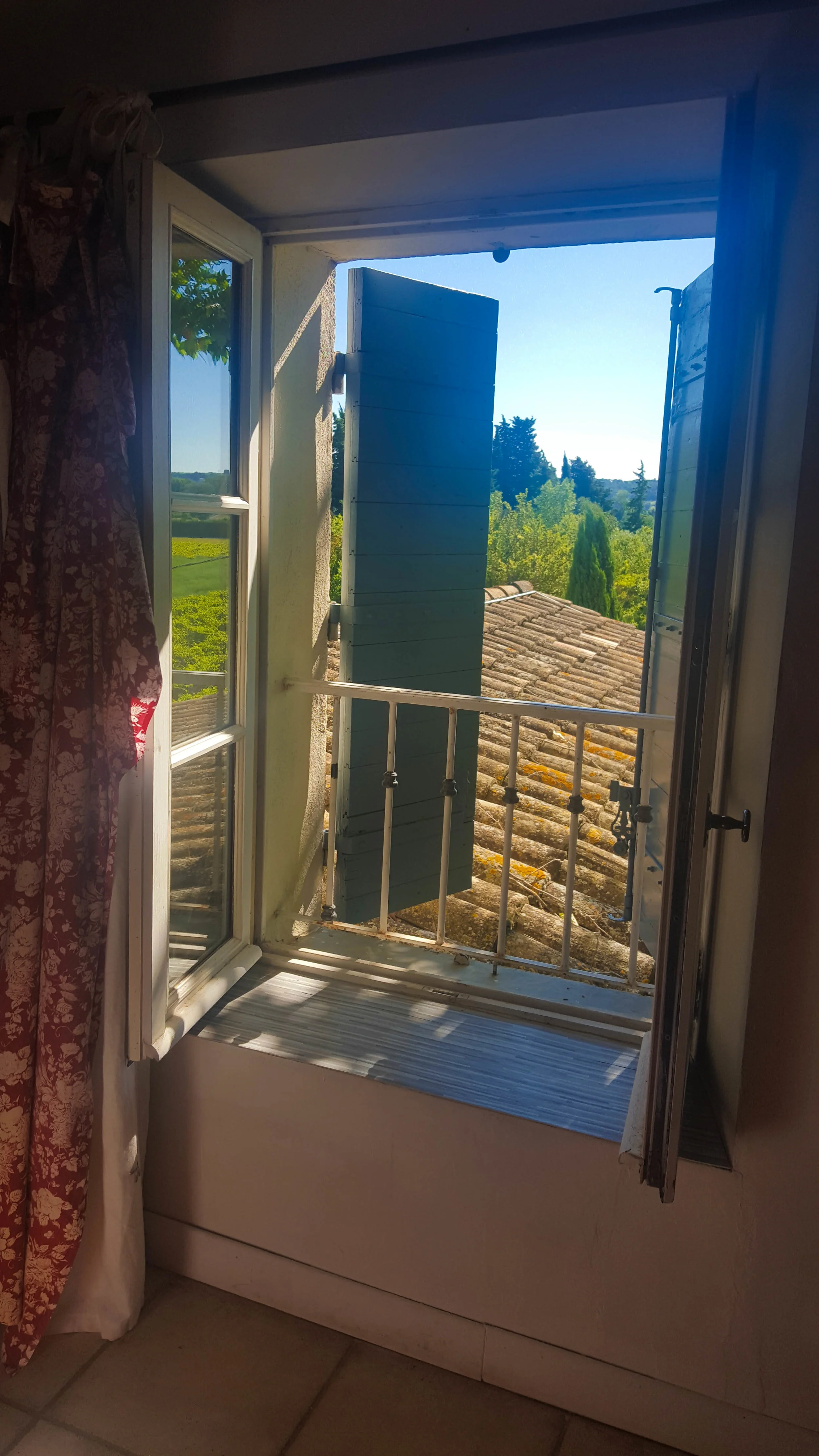 The bedroom shutters overlook green countryside fields