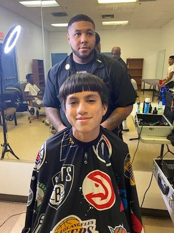 Alumni Gives Back! Free Haircuts given at Zimmerman Club