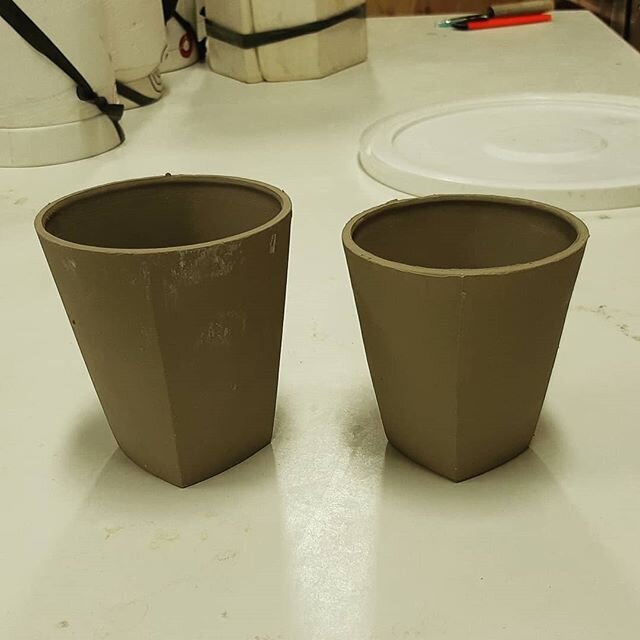 New cup casts! They're destined for the trash but still glad to see the results of the mold making.  The first cast of a new mold usually gets scrapped as little bits of plaster attach to the slip (visible on the left cup). .
.
.
#slipcasting #claysl