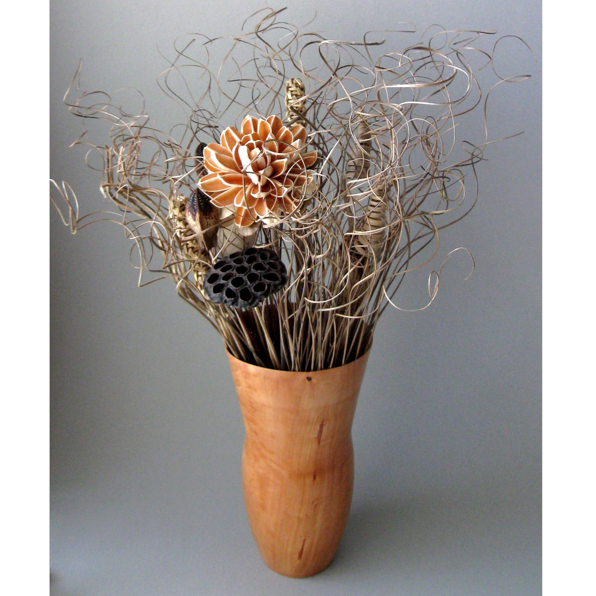 Artistic carrotwood vase