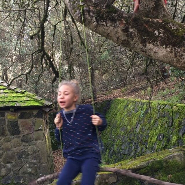 Kid-made swings and story time! S swings under falling moss, sprinkled down from young fingertips! We read a story about a little girl in Mexico, Elena, who wants to blow glass. We had nice conversations about who her allies were in supporting her fo