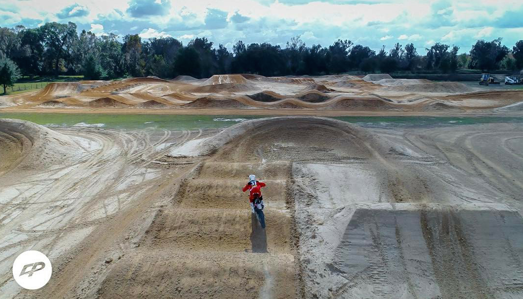 Cole works with the top athletes in the sport of Supercross and Motocross. Pictured is a great shot from Cole of Geico Honda rider RJ Hampshire putting in laps down in Florida.