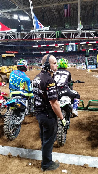 The starting gate is the last chance to racers and their mechanics to go over race strategy. Jeremiah uses this time to help Aj get focused and to remember key elements about the track and race.