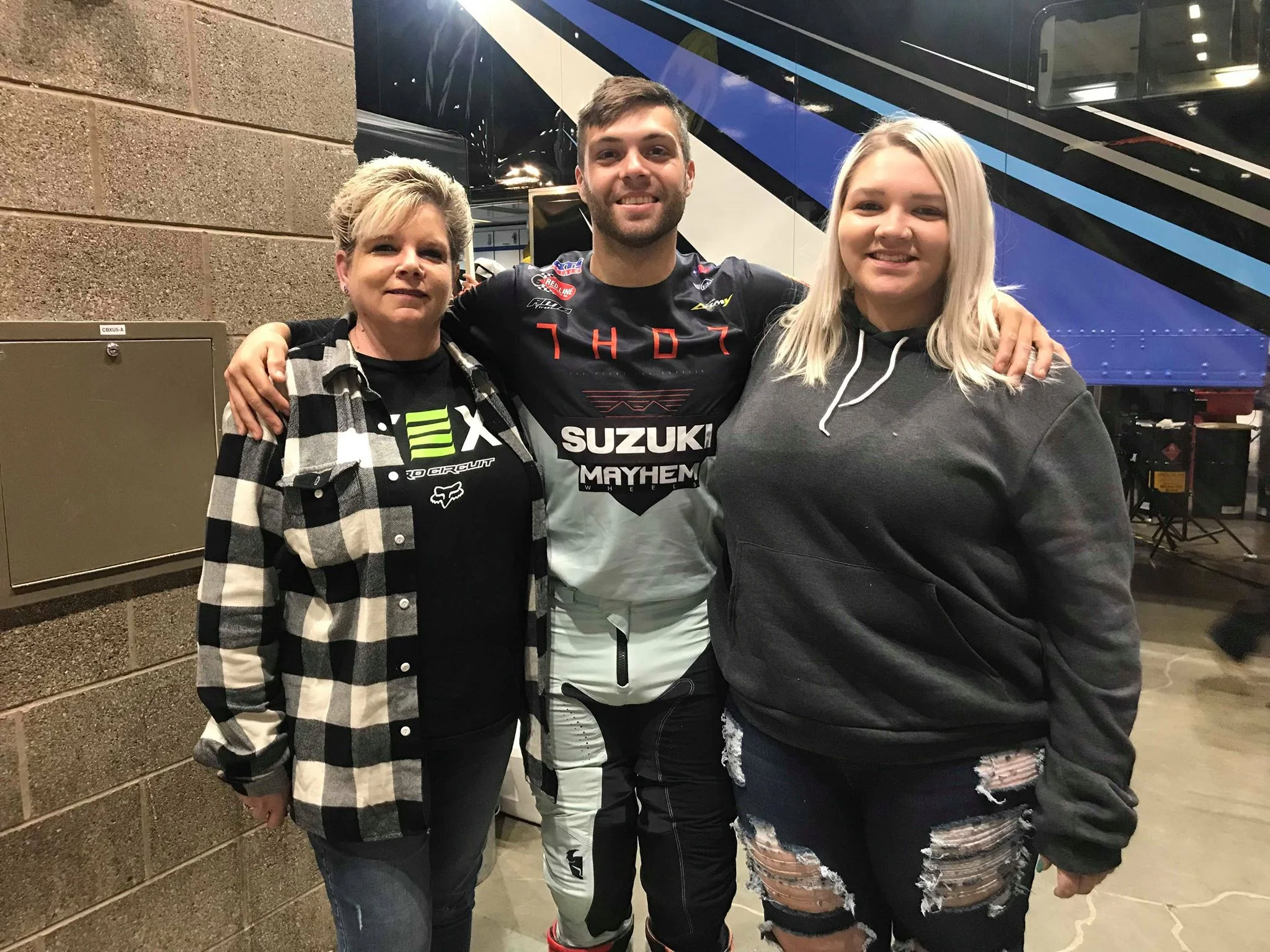 TCE rider Alex Ray smiles with some TCE program veterans in Seattle, WA. We always make sure we take care of our returning fans!