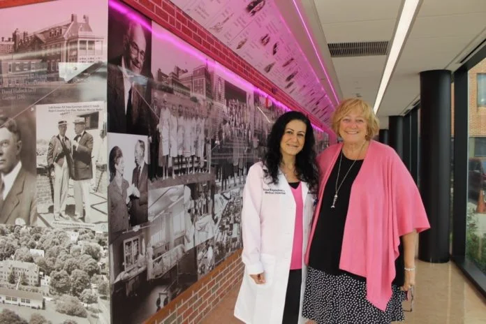 Dr. Edna Kapenhas, the medical director of the Ellen Hermanson Breast Center at Stony Brook Southampton Hospital, and Susie Roden, the center's patient navigator and outreach coordinator, dressed in pink for the spirit of National Breast Cancer Awareness Month. Christine Sampson photo