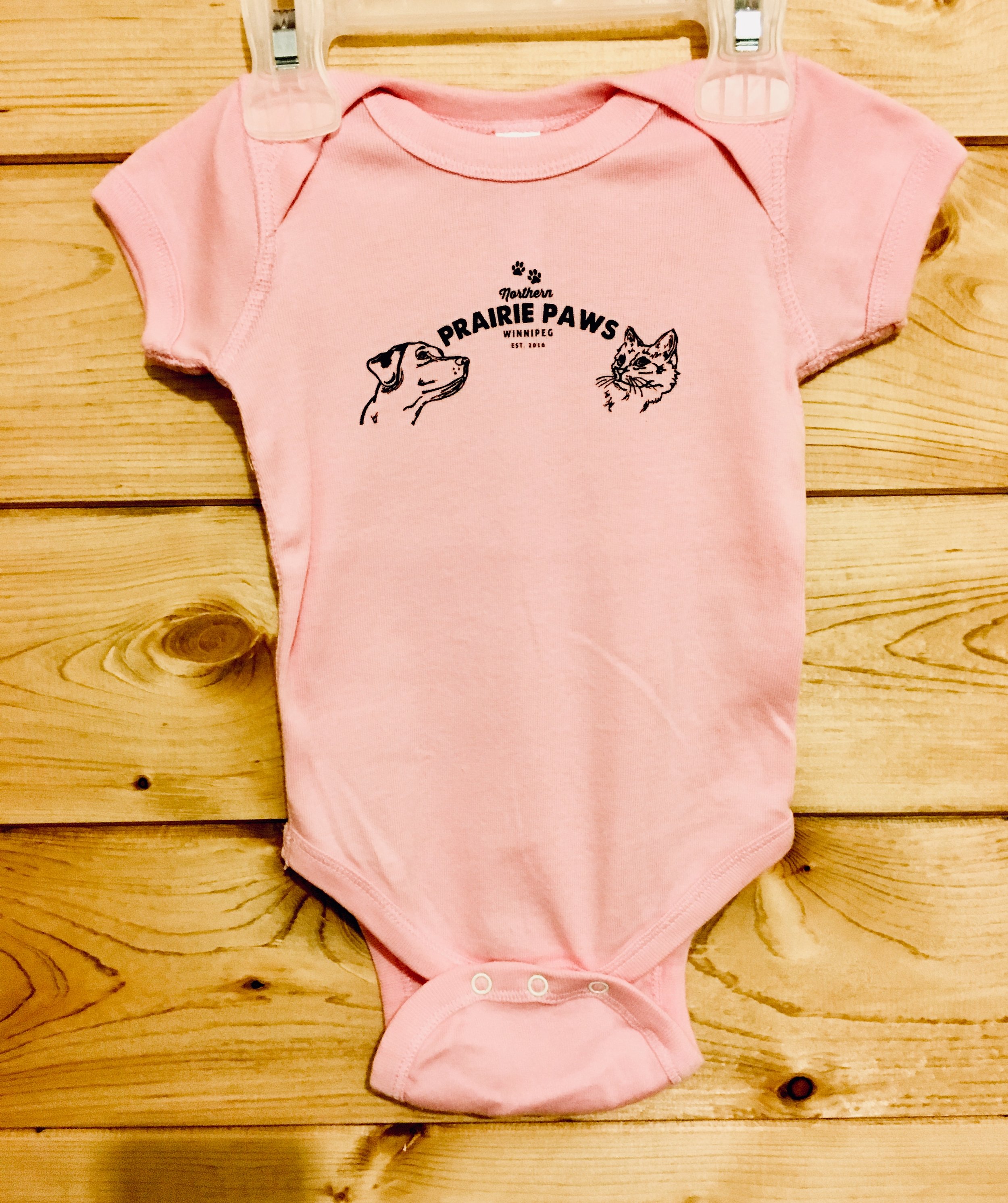 light pink baby onesie