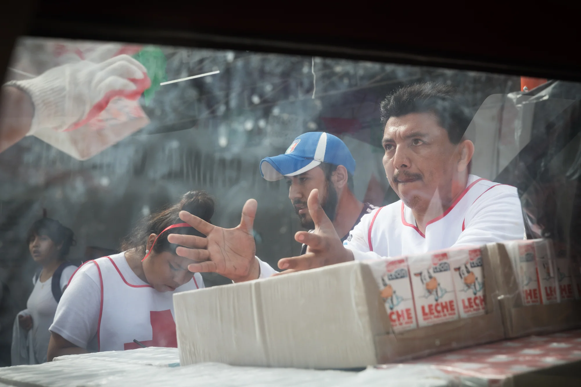Mexican Red Cross and volunteers oading provisions to distribute to impacted communities at the Red Cross headquarters in Cuautla Morelos. PHOTO: Francisco Alcala Torreslanda