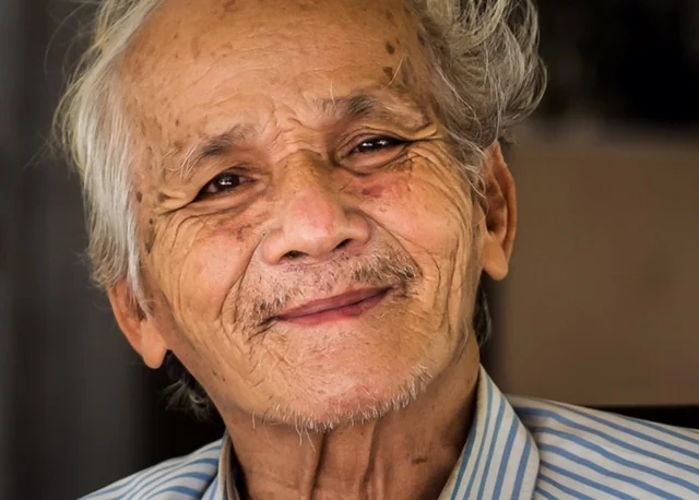 BOU MENG, A SURVIVOR FROM THE KHMER ROUGE PRISON, S-21. PHOTO: ANITA BONNARENS