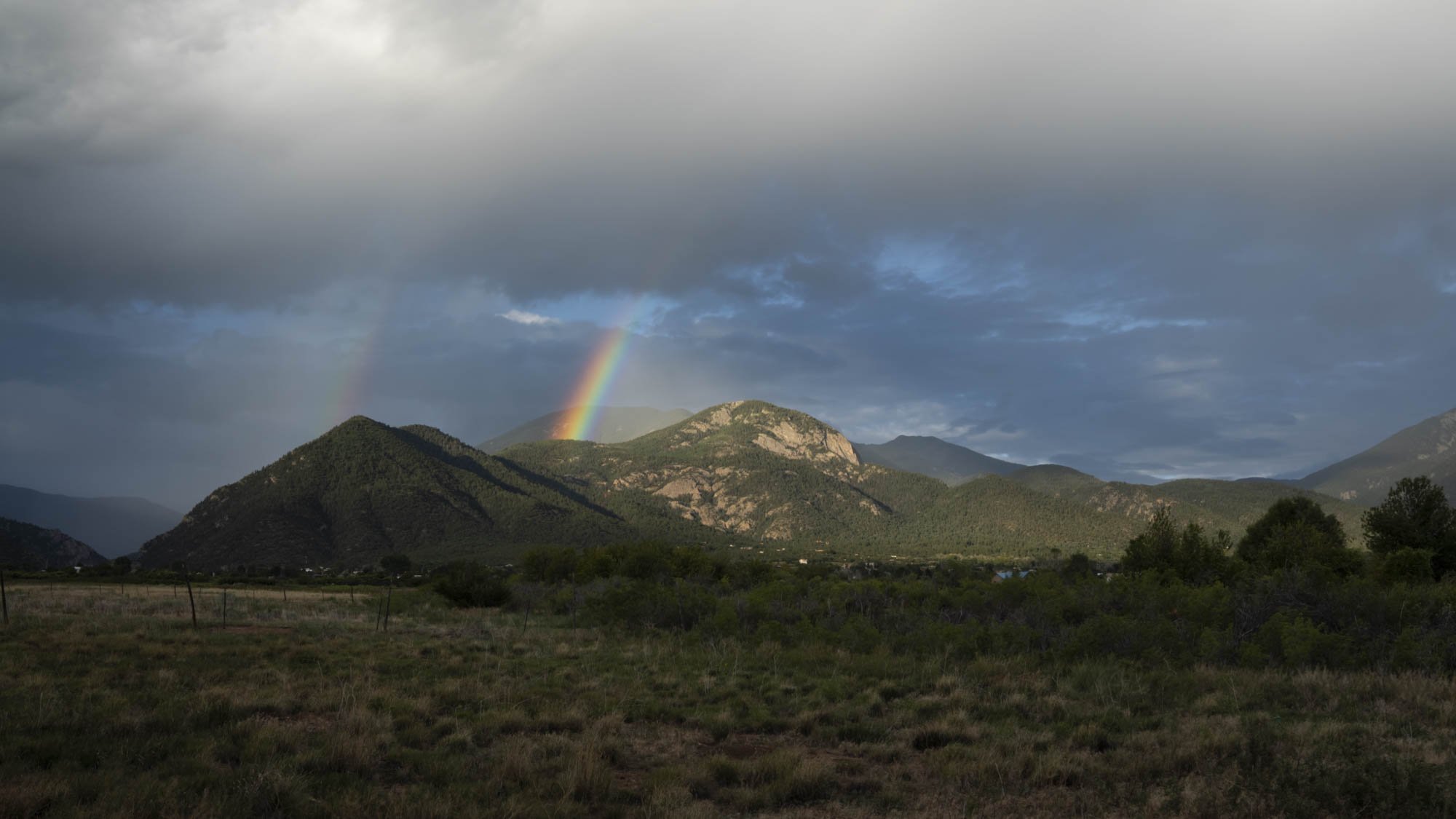   The hint of a rainbow pops out from behind Lucero Peak, the nearly 11,000’ summit of El Salto.  