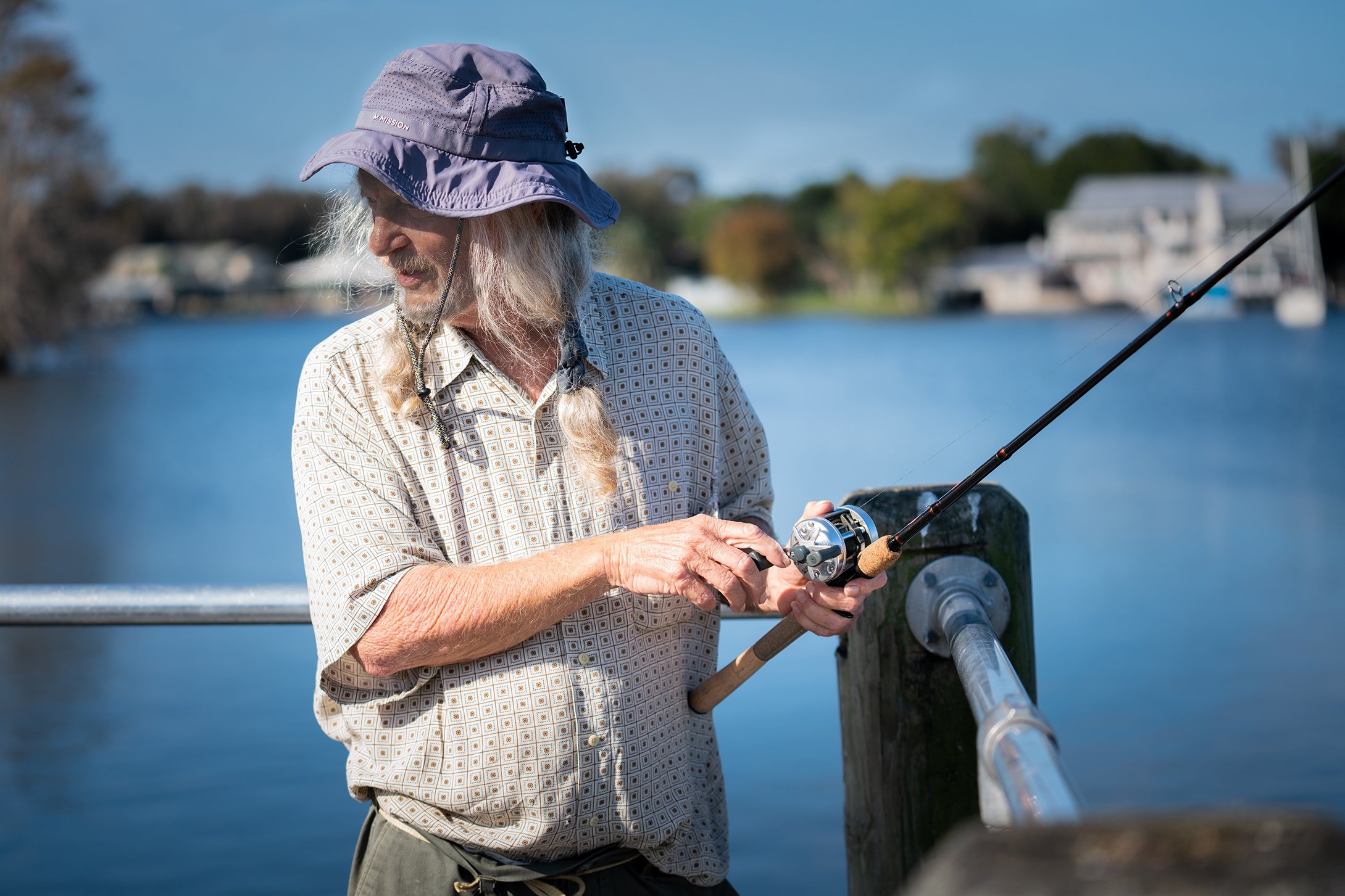   Mike fishing at the Kings Bay Park where he occasionally gets some fresh fish to cook up for the communities of abandoned cats that he cares for in Crystal River.  