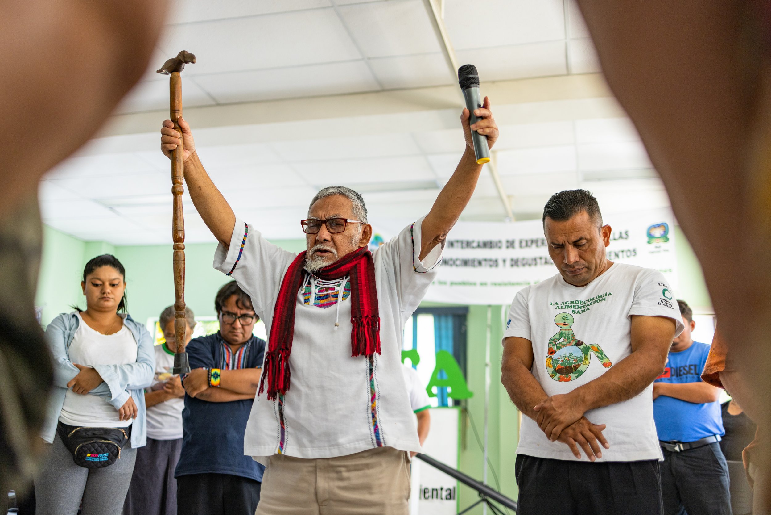  An indigenous leader facilitating a blessing ceremony for the seed exchange event. 