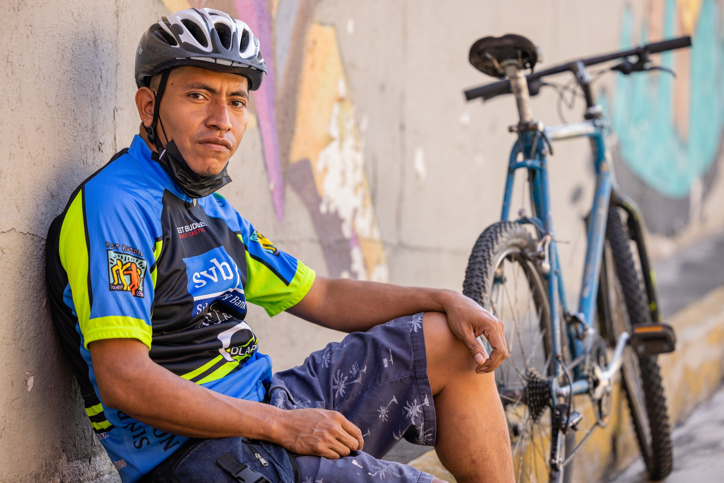  Maximiliano Cruz Garcia poses while taking a break on a group ride through San Salvador. 